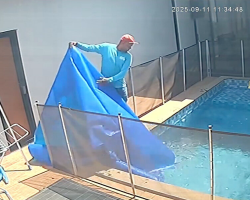 Pool Cleaner Lifts Cover — And Leaps In When He Sees A Dog At The Bottom