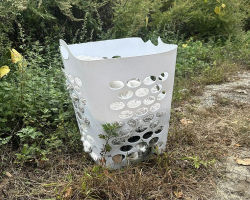 Driver Spots Laundry Basket On Roadside — Then Sees A Tiny Nose Peek Out