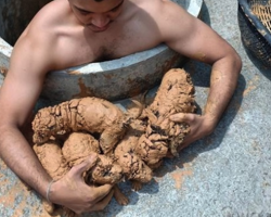 Man Hears Crying In A Well, Climbs In To Find 5 Puppies Caked In Mud