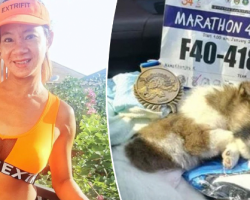 Marathon runner finds abandoned puppy halfway through race. Carries him for 19 miles