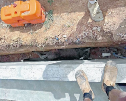 Construction Crew Spots Something Huge In A Trench — And Rushes To Help