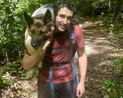 Hikers Spot a Mysterious Shape in the Woods — Then Realize a Dog Is Lying There, Unable to Move