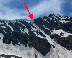 Hikers Spot Tiny ‘Speck Of Black’ On Mountain — Then Realize A Dog Is Clinging To Life
