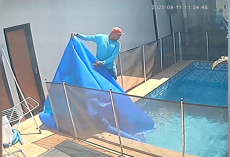 Pool Cleaner Lifts Cover — And Leaps In When He Sees A Dog At The Bottom