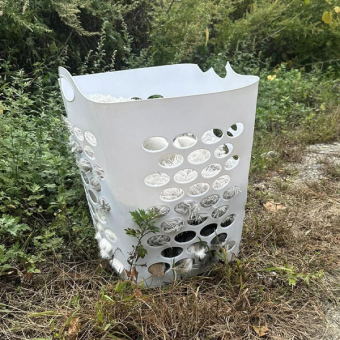 Driver Spots Laundry Basket On Roadside — Then Sees A Tiny Nose Peek Out
